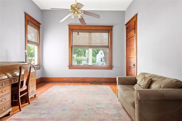 901 S 3rd St, Leavenworth, KS 66048 - home office featuring plenty of natural light, wood finished floors, baseboards, and ceiling fan