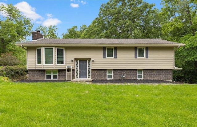 3601 NW 56th St, Houston Lake, MO 64151 - split foyer home featuring a chimney and a front yard