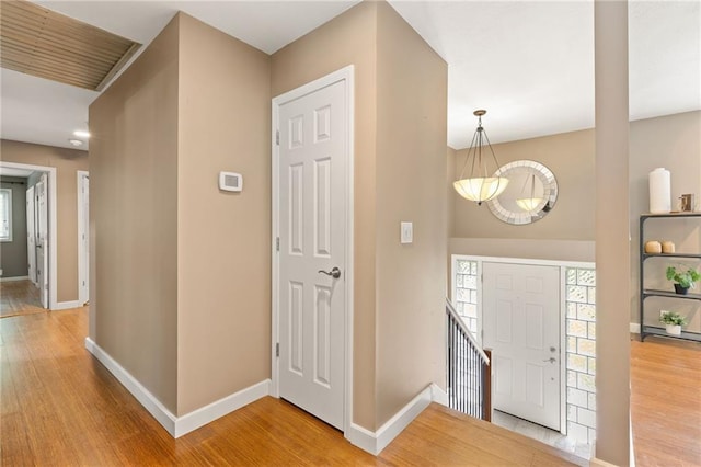 3601 NW 56th St, Houston Lake, MO 64151 - foyer entrance featuring baseboards and light wood finished floors