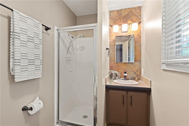 3601 NW 56th St, Houston Lake, MO 64151 - full bath featuring a stall shower, vanity, and backsplash