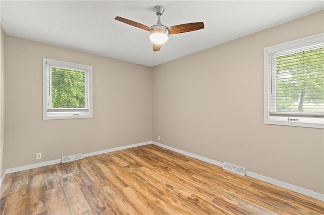 3601 NW 56th St, Houston Lake, MO 64151 - unfurnished room featuring light wood-style floors, baseboards, and ceiling fan