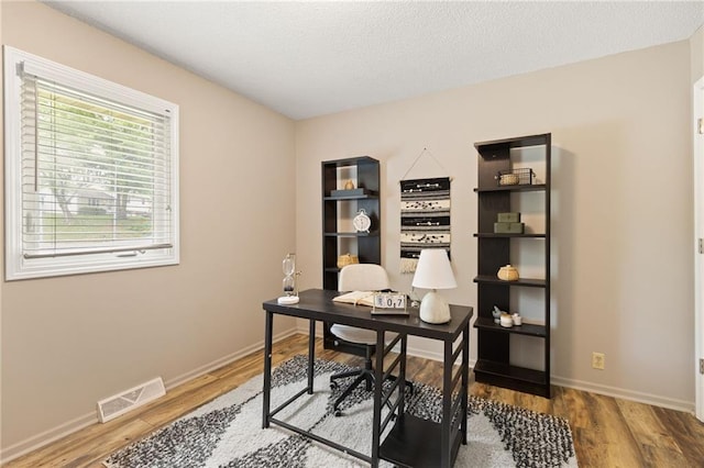 3601 NW 56th St, Houston Lake, MO 64151 - office with light wood finished floors and baseboards