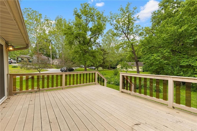 3601 NW 56th St, Houston Lake, MO 64151 - wooden terrace featuring view of wooded area