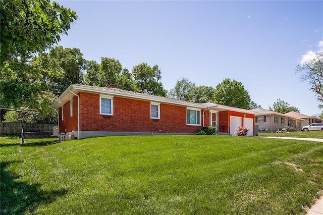 1501 Osage St, Leavenworth, KS 66048 - single story home featuring a garage and brick siding