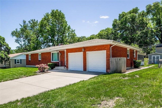 1501 Osage St, Leavenworth, KS 66048 - ranch-style home with an attached garage, brick siding, driveway, and a front lawn