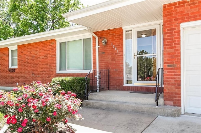 1501 Osage St, Leavenworth, KS 66048 - entrance to property featuring brick siding and a garage