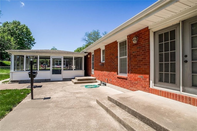 1501 Osage St, Leavenworth, KS 66048 - view of patio / terrace with a sunroom