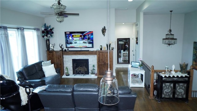 6418 N 141st St, Basehor, KS 66007 - living room featuring ceiling fan, wood finished floors, and a fireplace