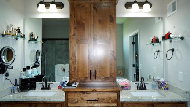 6418 N 141st St, Basehor, KS 66007 - bathroom featuring vanity and a shower with shower door