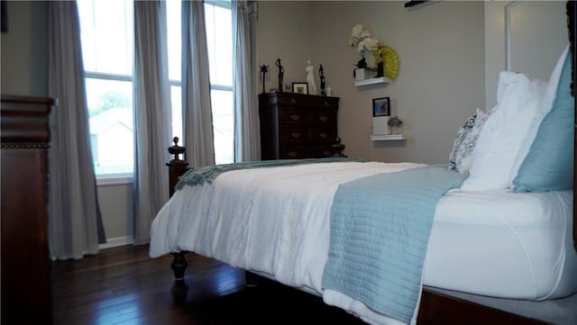 6418 N 141st St, Basehor, KS 66007 - bedroom featuring wood finished floors and baseboards