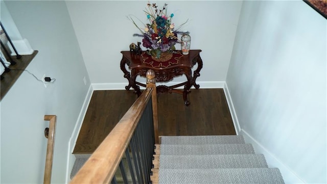 6418 N 141st St, Basehor, KS 66007 - staircase featuring baseboards and wood finished floors
