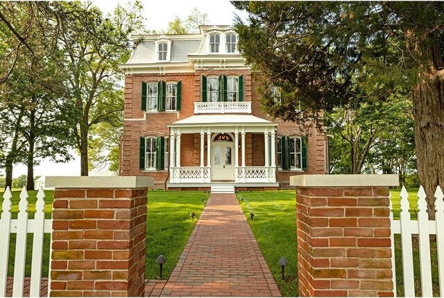 20400 280th Trl, Malta Bend, MO 65339 - second empire-style home with brick siding, covered porch, and mansard roof