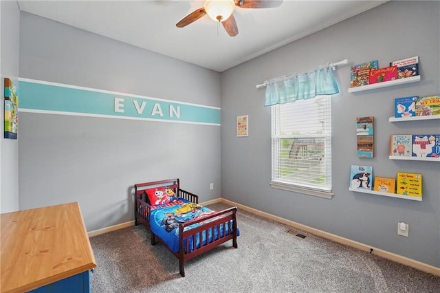 10136 N Wallace Ave, Kansas City, MO 64157 - bedroom with baseboards, carpet, and a ceiling fan