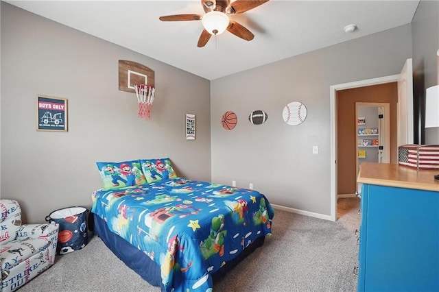 10136 N Wallace Ave, Kansas City, MO 64157 - carpeted bedroom with baseboards and ceiling fan