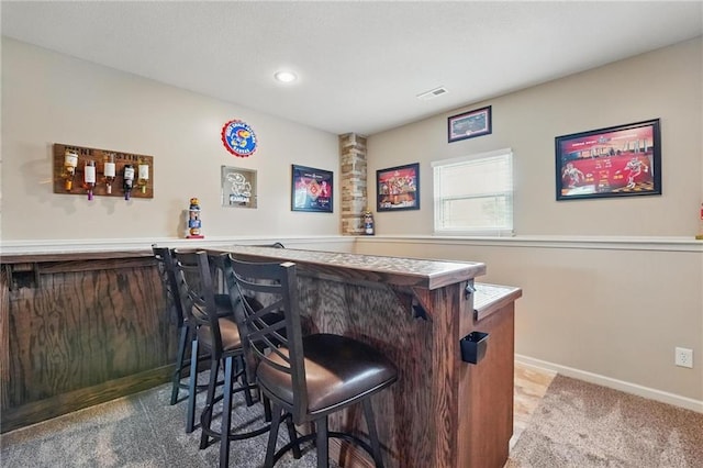 10136 N Wallace Ave, Kansas City, MO 64157 - indoor dry bar with baseboards, recessed lighting, and carpet floors