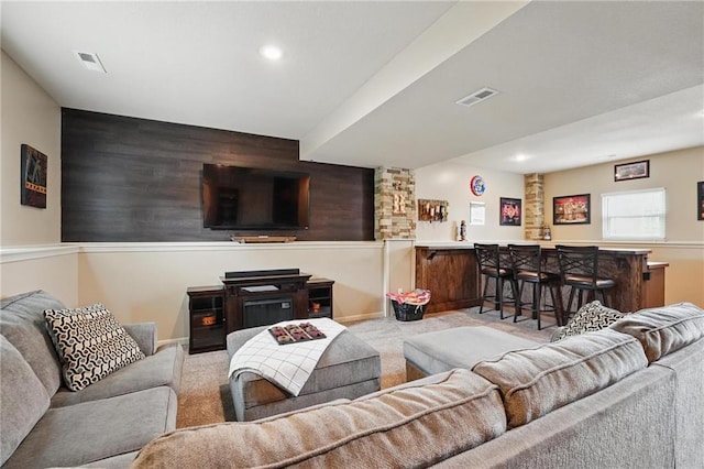 10136 N Wallace Ave, Kansas City, MO 64157 - living area with bar, carpet, recessed lighting, and an accent wall