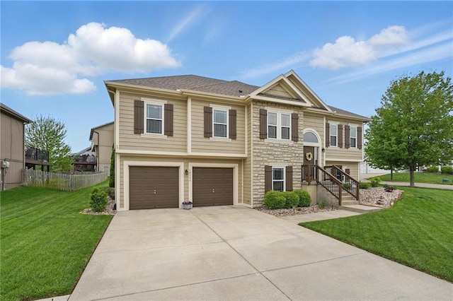10136 N Wallace Ave, Kansas City, MO 64157 - raised ranch featuring stone siding, concrete driveway, and a garage