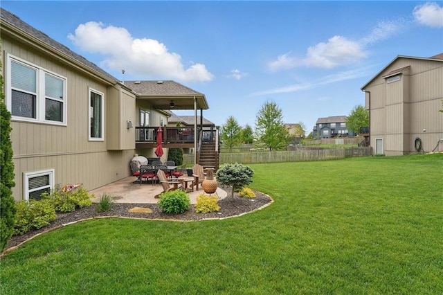10136 N Wallace Ave, Kansas City, MO 64157 - view of yard with stairway, a patio area, and a wooden deck