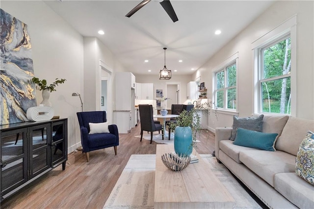 18 Beechwood Ln, Linn Valley, KS 66040 - living room featuring light wood finished floors, recessed lighting, ceiling fan, and baseboards