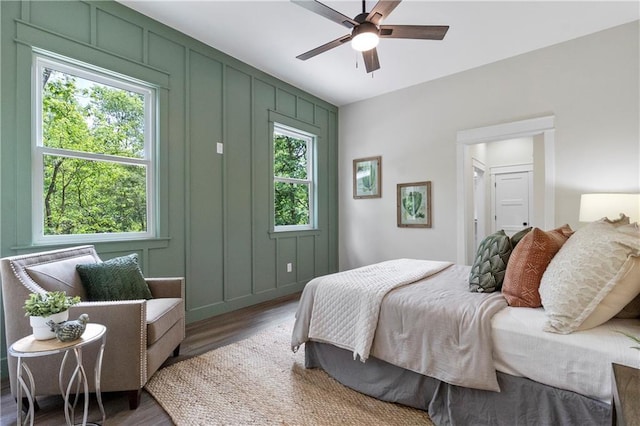 18 Beechwood Ln, Linn Valley, KS 66040 - bedroom featuring wood finished floors, a decorative wall, and ceiling fan