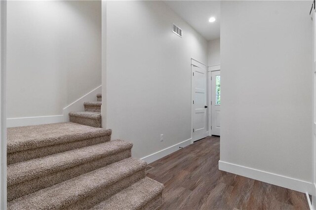 18 Beechwood Ln, Linn Valley, KS 66040 - stairway with baseboards, wood finished floors, and recessed lighting