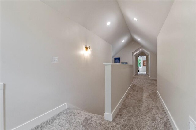 18 Beechwood Ln, Linn Valley, KS 66040 - corridor with carpet, lofted ceiling, and baseboards