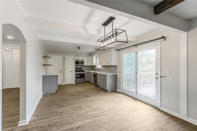 10908 Indiana Ave, Kansas City, MO 64137 - kitchen featuring stainless steel appliances, gray cabinetry, light wood finished floors, beamed ceiling, and light countertops