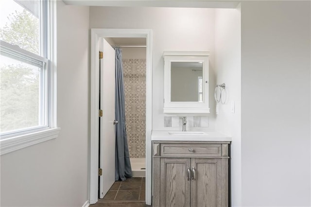 10908 Indiana Ave, Kansas City, MO 64137 - full bathroom featuring curtained shower and vanity