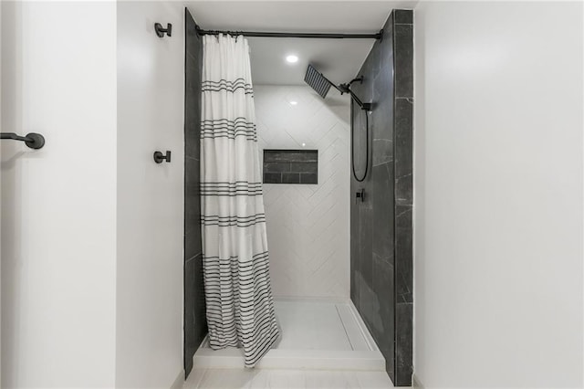 10908 Indiana Ave, Kansas City, MO 64137 - bathroom featuring tiled shower and recessed lighting