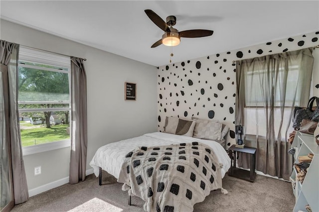 807 N Main St, Carrollton, MO 64633 - bedroom featuring multiple windows, carpet flooring, and baseboards