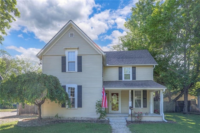 1101 S Independence St, Harrisonville, MO 64701 - traditional-style house with covered porch and roof with shingles