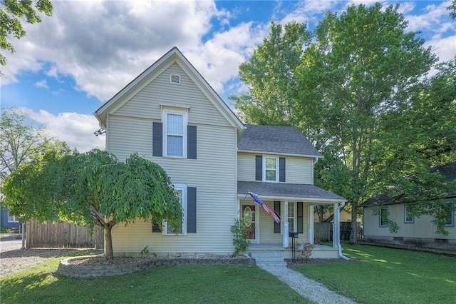 1101 S Independence St, Harrisonville, MO 64701 - view of front of home with covered porch and a shingled roof