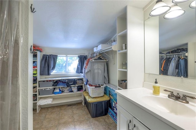 1101 S Independence St, Harrisonville, MO 64701 - spacious closet featuring a sink