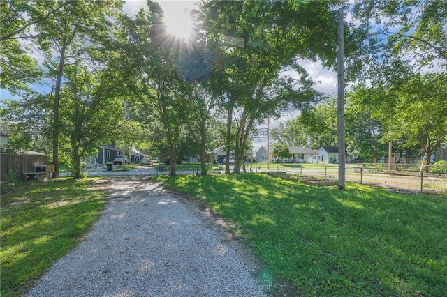 1101 S Independence St, Harrisonville, MO 64701 - view of road featuring a residential view