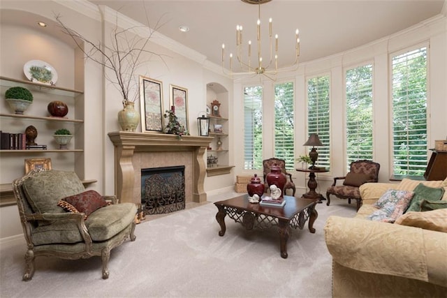 14301 Briar St, Leawood, KS 66224 - carpeted living area featuring ornamental molding, a chandelier, built in shelves, a fireplace with flush hearth, and plenty of natural light