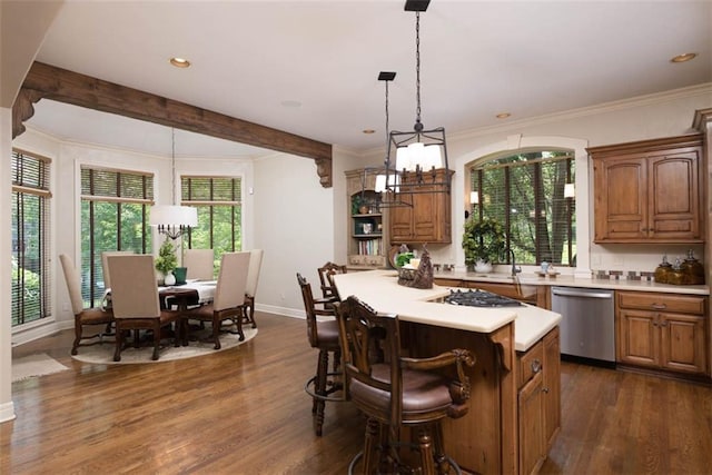 14301 Briar St, Leawood, KS 66224 - kitchen featuring stainless steel appliances, light countertops, dark wood-style floors, brown cabinets, and crown molding