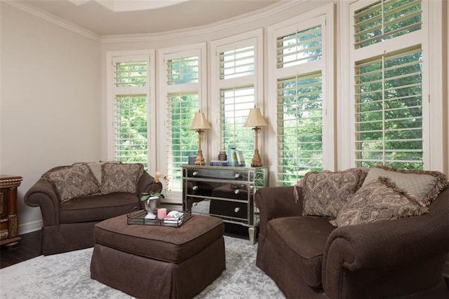 14301 Briar St, Leawood, KS 66224 - living area featuring wood finished floors, healthy amount of natural light, and ornamental molding