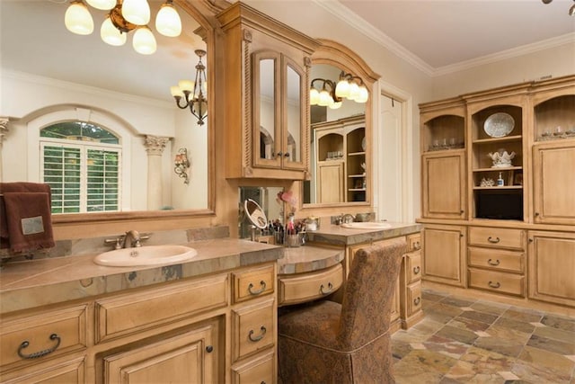 14301 Briar St, Leawood, KS 66224 - bathroom with a chandelier, vanity, ornamental molding, and stone finish floors