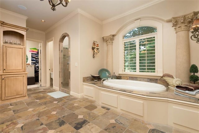 14301 Briar St, Leawood, KS 66224 - bathroom featuring a shower stall, a garden tub, stone finish flooring, a spacious closet, and ornamental molding