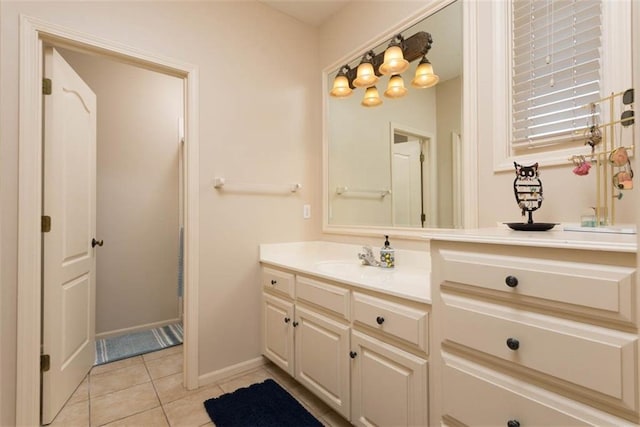 14301 Briar St, Leawood, KS 66224 - bathroom with vanity and tile patterned flooring