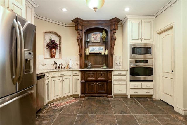14301 Briar St, Leawood, KS 66224 - kitchen with appliances with stainless steel finishes, cream cabinetry, ornamental molding, decorative backsplash, and light stone counters
