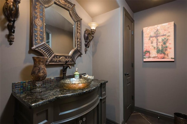 14301 Briar St, Leawood, KS 66224 - bathroom with vanity and tile patterned flooring