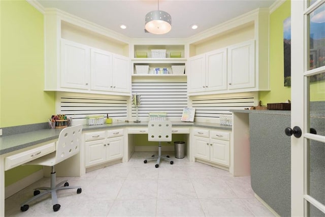 14301 Briar St, Leawood, KS 66224 - office area with built in desk, crown molding, and recessed lighting