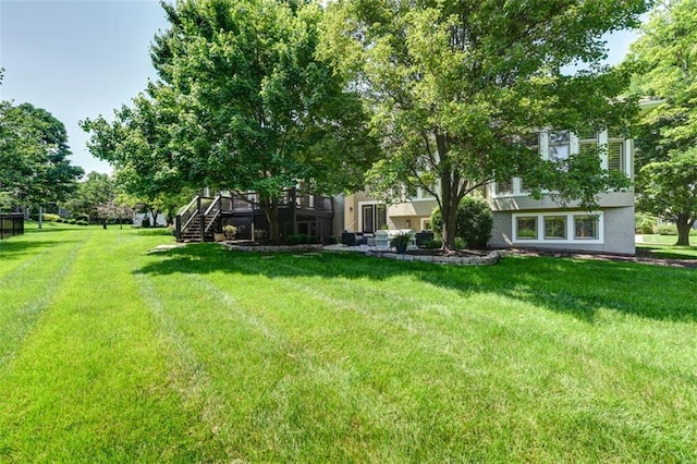 14301 Briar St, Leawood, KS 66224 - view of grassy yard featuring a deck and stairway