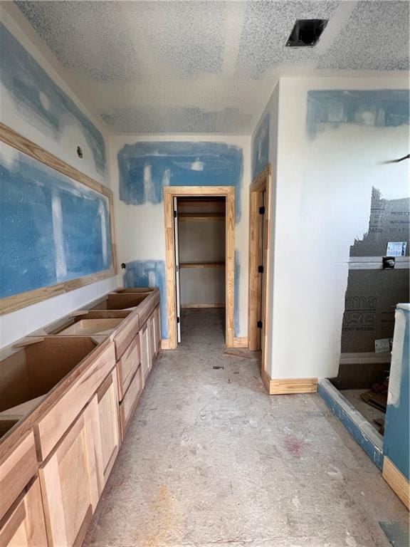 16500 Ingalls St, Gardner, KS 66030 - bathroom with a textured ceiling and baseboards