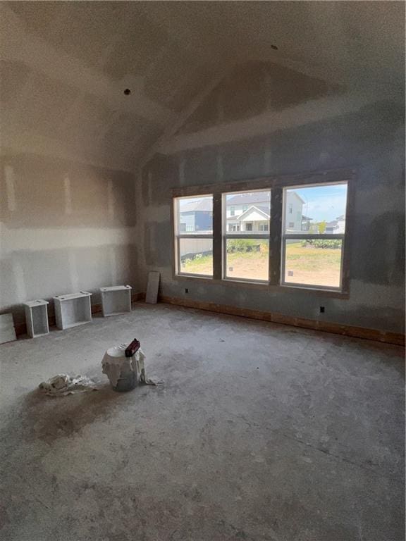 16500 Ingalls St, Gardner, KS 66030 - empty room featuring healthy amount of natural light and lofted ceiling