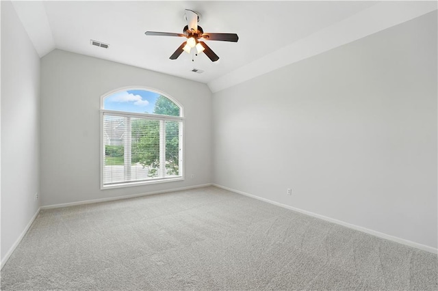 13905 Lucille St, Overland Park, KS 66221 - spare room featuring carpet flooring, a ceiling fan, and vaulted ceiling