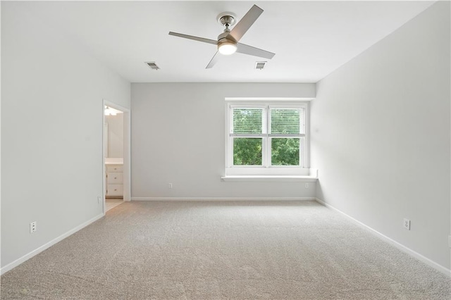 13905 Lucille St, Overland Park, KS 66221 - unfurnished room featuring light carpet and a ceiling fan