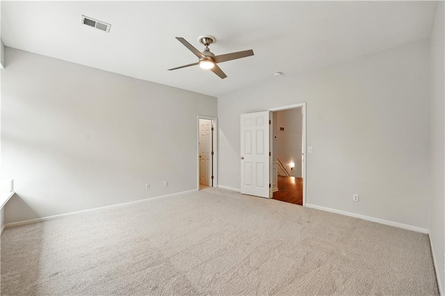 13905 Lucille St, Overland Park, KS 66221 - unfurnished bedroom with light colored carpet and ceiling fan