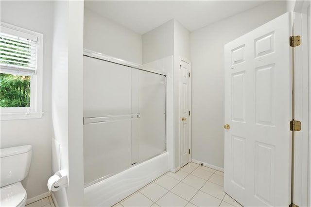 13905 Lucille St, Overland Park, KS 66221 - full bath with enclosed tub / shower combo and tile patterned flooring